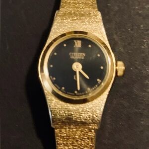 Vintage Citizen Quartz Women's Gold Tone Watch with Black Dial